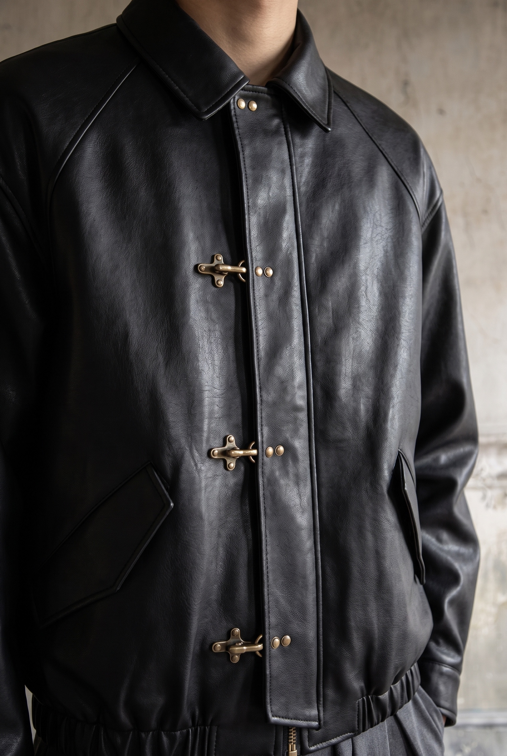 Leather Blouson and Pleated Shorts: jacket detail