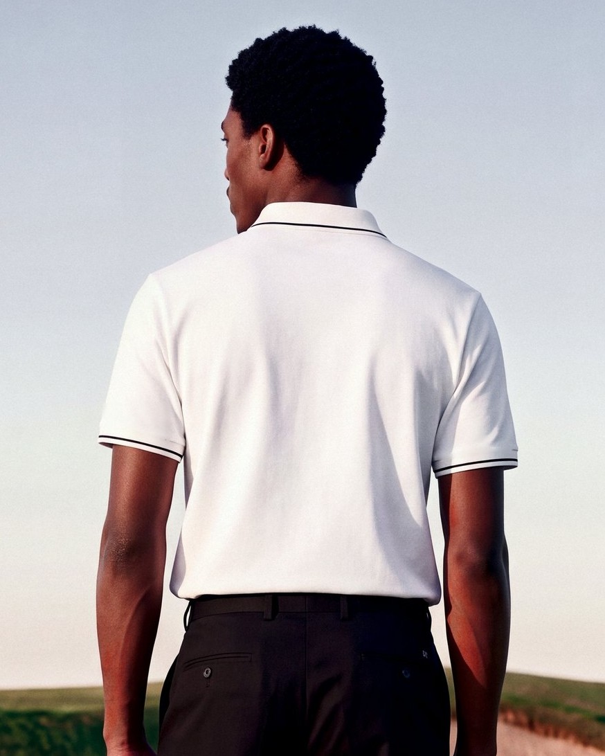 White Polo, Black Chest Band: back view