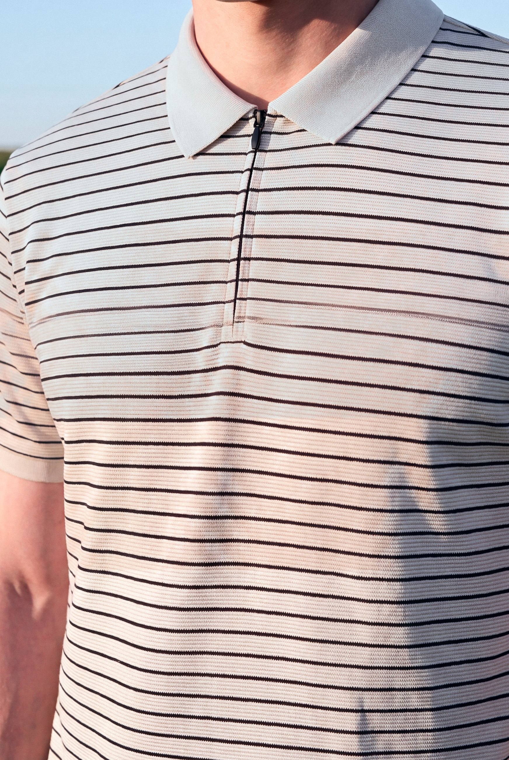 Striped Zip Polo and Olive Shorts: polo detail